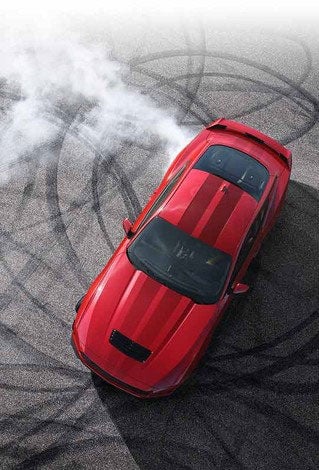 Overhead view of a 2024 Ford Mustang® model with tire tracks on pavement | Jordan Ford in Mishawaka IN