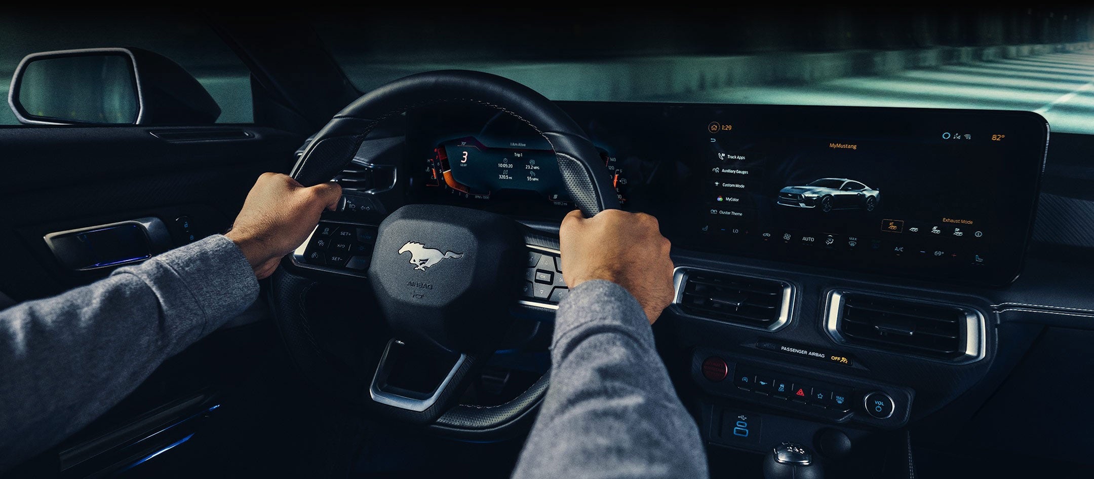 A 2024 Ford Mustang® model interior with a person driving | Jordan Ford in Mishawaka IN